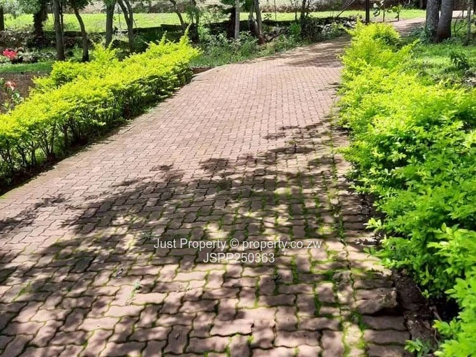 7-Bed Lake Chivero Estate: Your Private Woodland Sanctuary